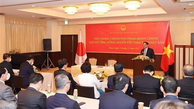 越南政府总理范明正会见旅居日本越南人代表。（图片来源：越通社）