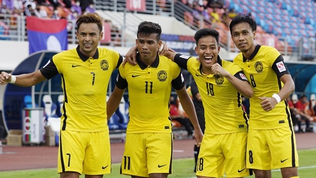 马来西亚球员们庆祝进球。