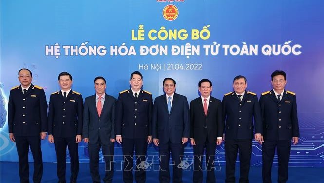 政府总理范明正出席全国电子发票系统公布仪式。（图片来源：越通社）