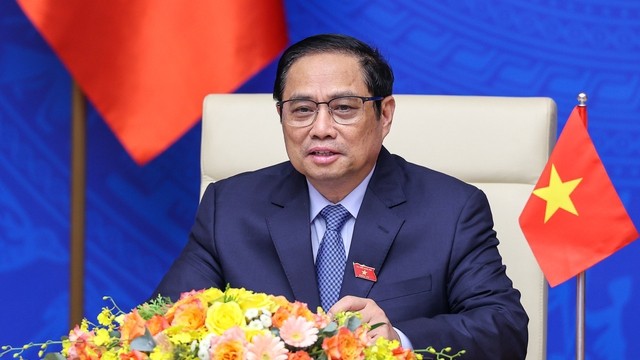 越南政府总理范明正发表讲话。（图片来源：VGP）